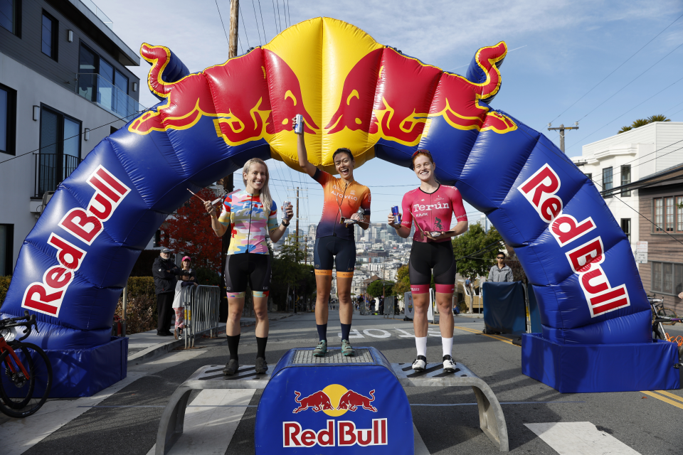 Niky Taylor celebrates on the podium at the Red Bull Bay Climb in San Francisco, California, USA on October