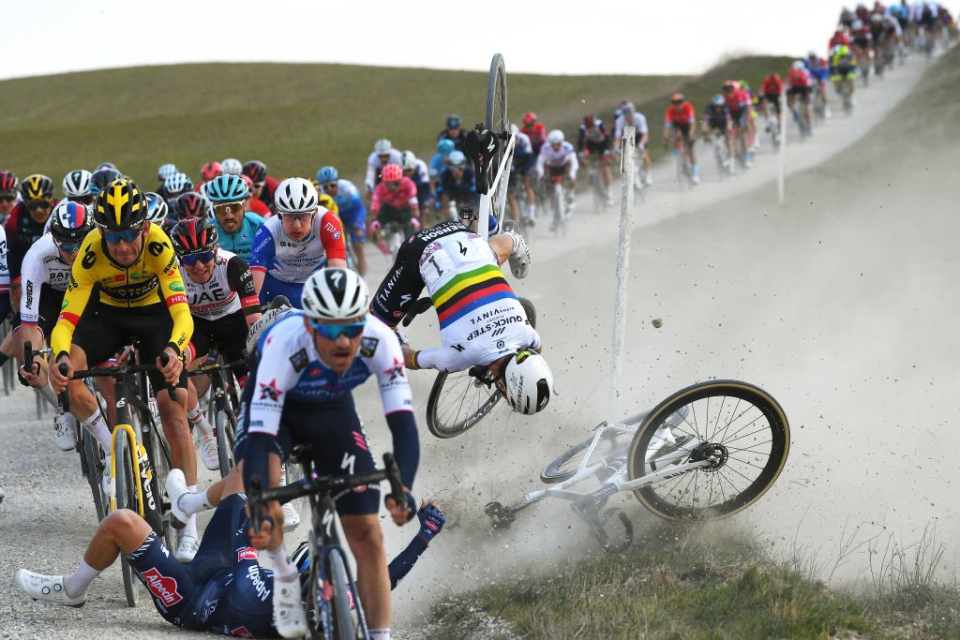 Reigning world champion and Pre-race favourite Julian Alaphilippe flew dramatically over his handlebars