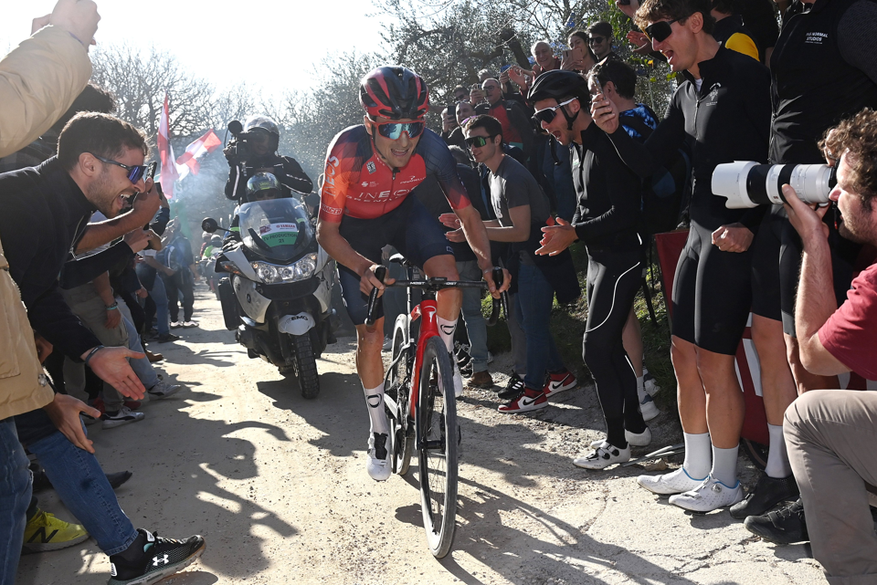 Brit Tom Pidcock attacks to solo to Strade Bianche Victory
