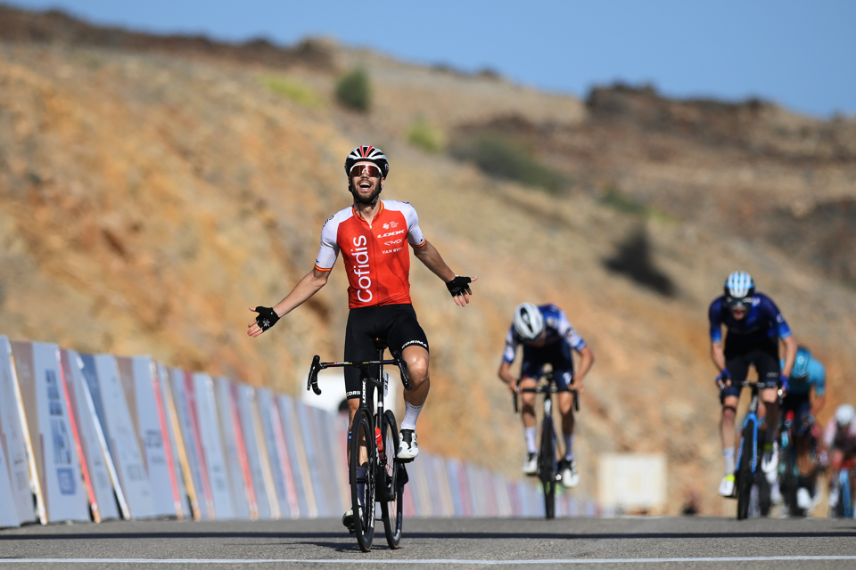 Jesus Herrada wins uphill sprint to take the Tour of Oman lead