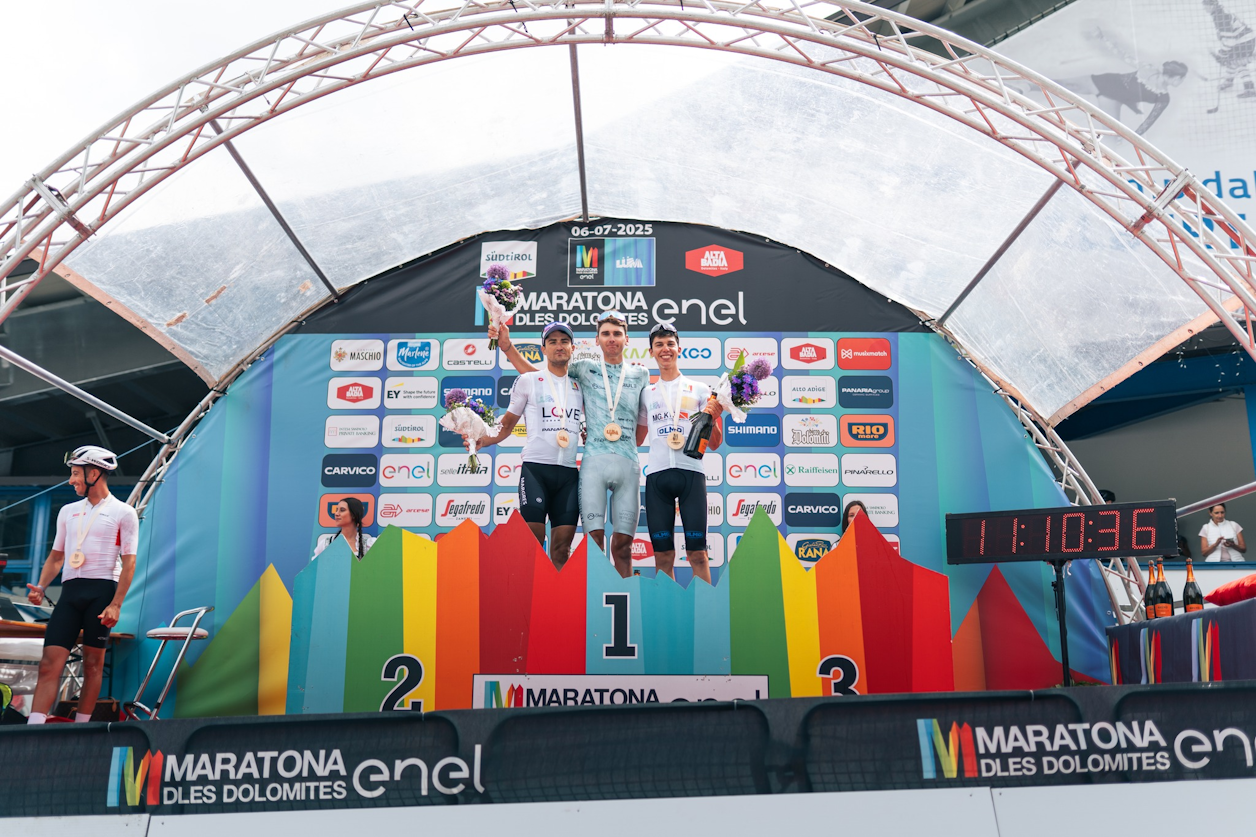 Photo: L to R: David Mayo (ES) 2nd, Luca Cavallo (IT) 1st, Giuseppe Orlando (IT) 3rd - Credit: Maratona dles Dolomites