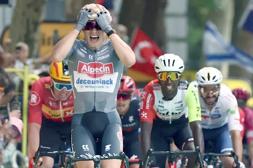 Jasper Philipsen wins opening sprint and takes the Yellow Jersey
