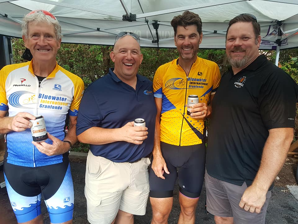ex Pro cyclist and commentator Frankie Andreau (third from right) enjoys a few beers with the organizing team and volunteers