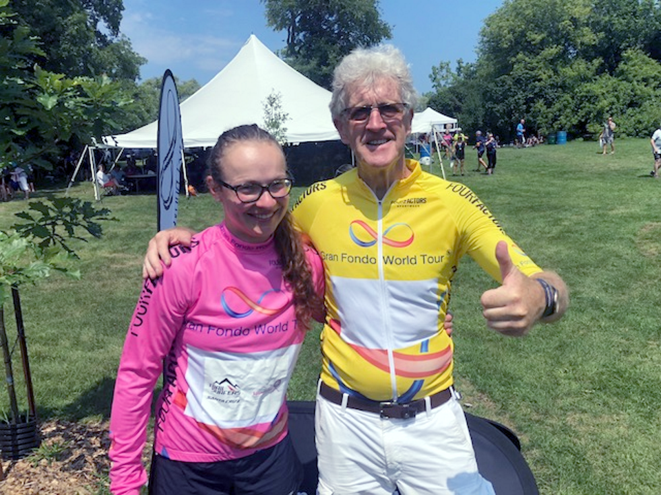Women's leader and Pink Jersey wearer German cyclist Lousie Jugnickel with lead event organizer Kenneth MacAlpine sporting the mens leaders Yellow jersey