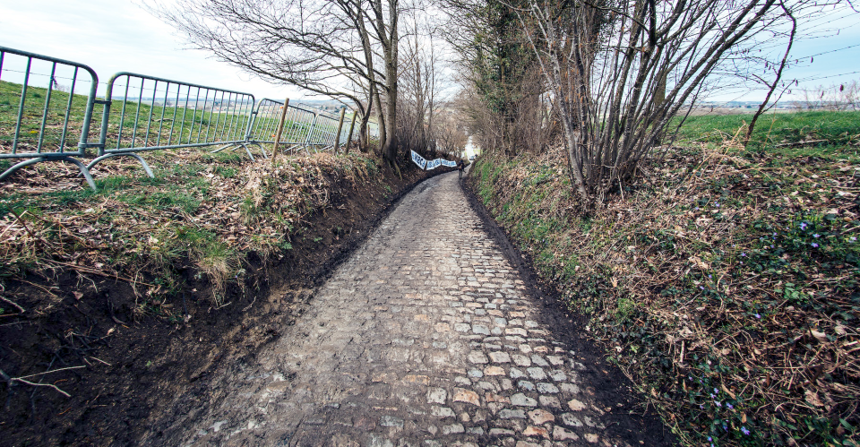 The infamous cobbled climb of the Muur de Geraardsbergen, with ramps up to 20 percent, followed shortly after by the Bosberg, serve as the finale