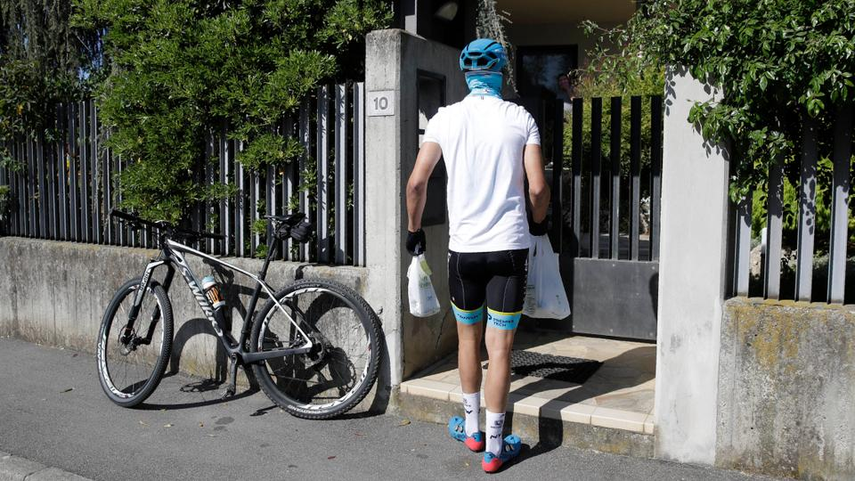 Martinelli uses his bike to deliver medicine in the hard hit Lombardy region