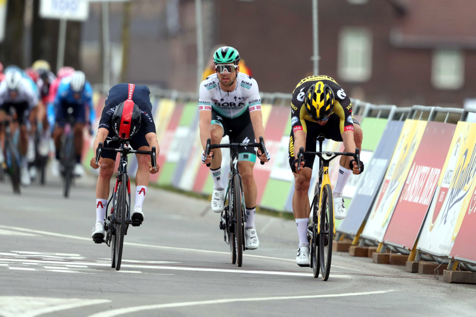 Van Aert wins by a whisker in front of Tom Pidcock in photo-finish at Amstel Gold Race