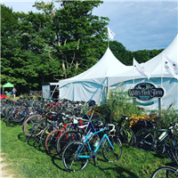 Hundreds of bikes line up at Wolfes Neck Farm for Farm to Fork Fondo - Maine. Lots of farm treats awaited out on course!