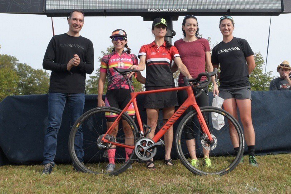 Congratulations to Debbie Milne (middle) for winning the womens Gran Fondo and a Canyon Bike