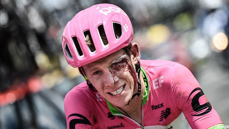 Craddock's crash occurred when he hit a dropped water bottle in the feeding zone and collided with a spectator. Blood from a cut to his left eyebrow covered his face .