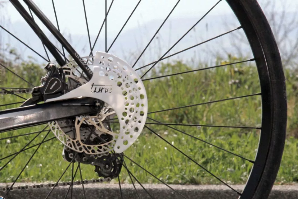 German manufacturer Tune has released details of their most recent prototype disc brake rotor safety covers in what they are calling Project Disc Sheath
